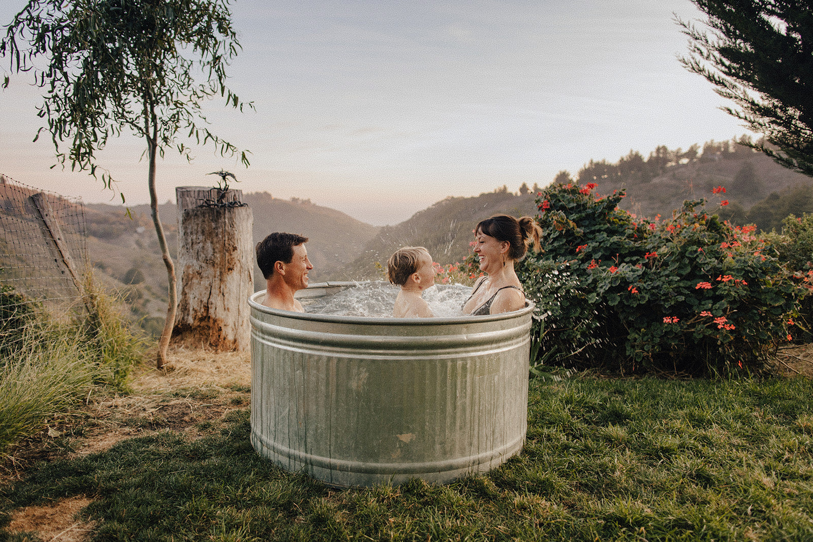 Family in outdoor bath in Big Sur