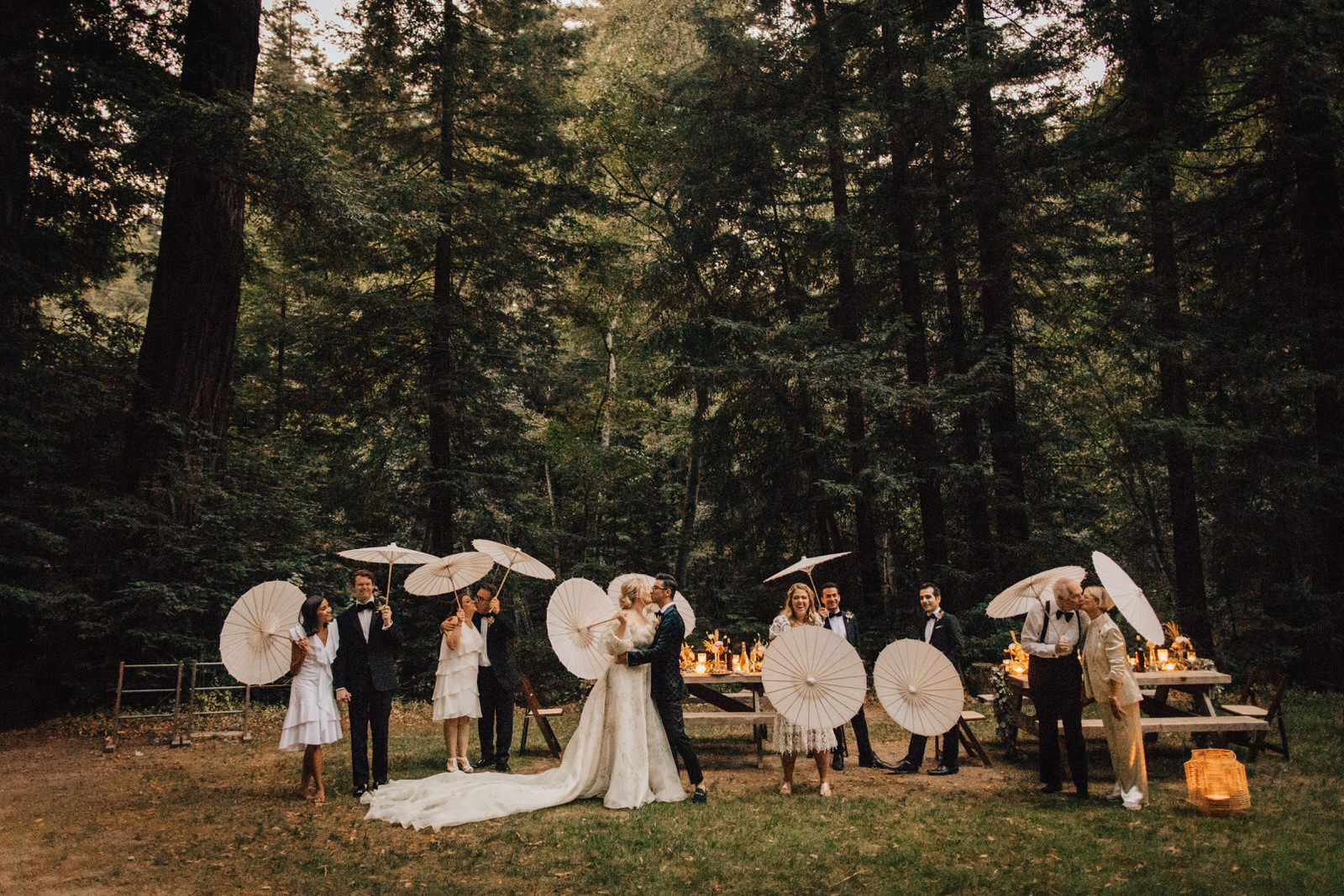 Wedding party with parasols