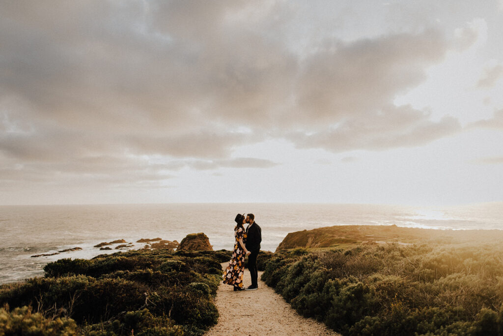 Couple walks together during Big Sur elopement session