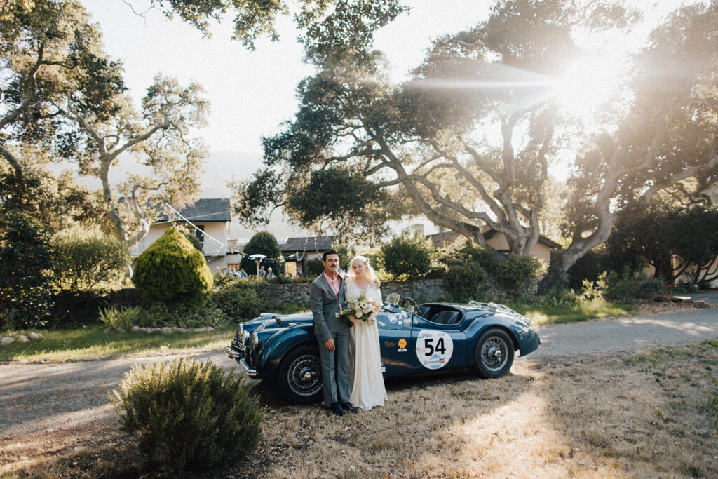bride and groom portraits with a vintage car